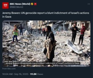 A group of people walking in rubble
Description automatically generated