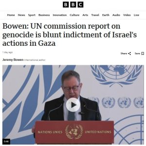 A person speaking at a podium
Description automatically generated