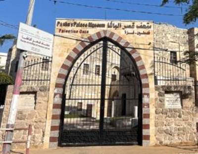 A gated entrance to a building
Description automatically generated